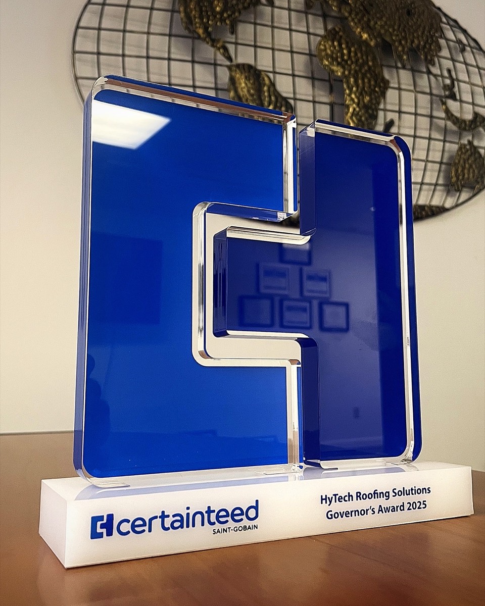 HyTech Roofing Solutions holding the CertainTeed Governor's Award 2025 trophy