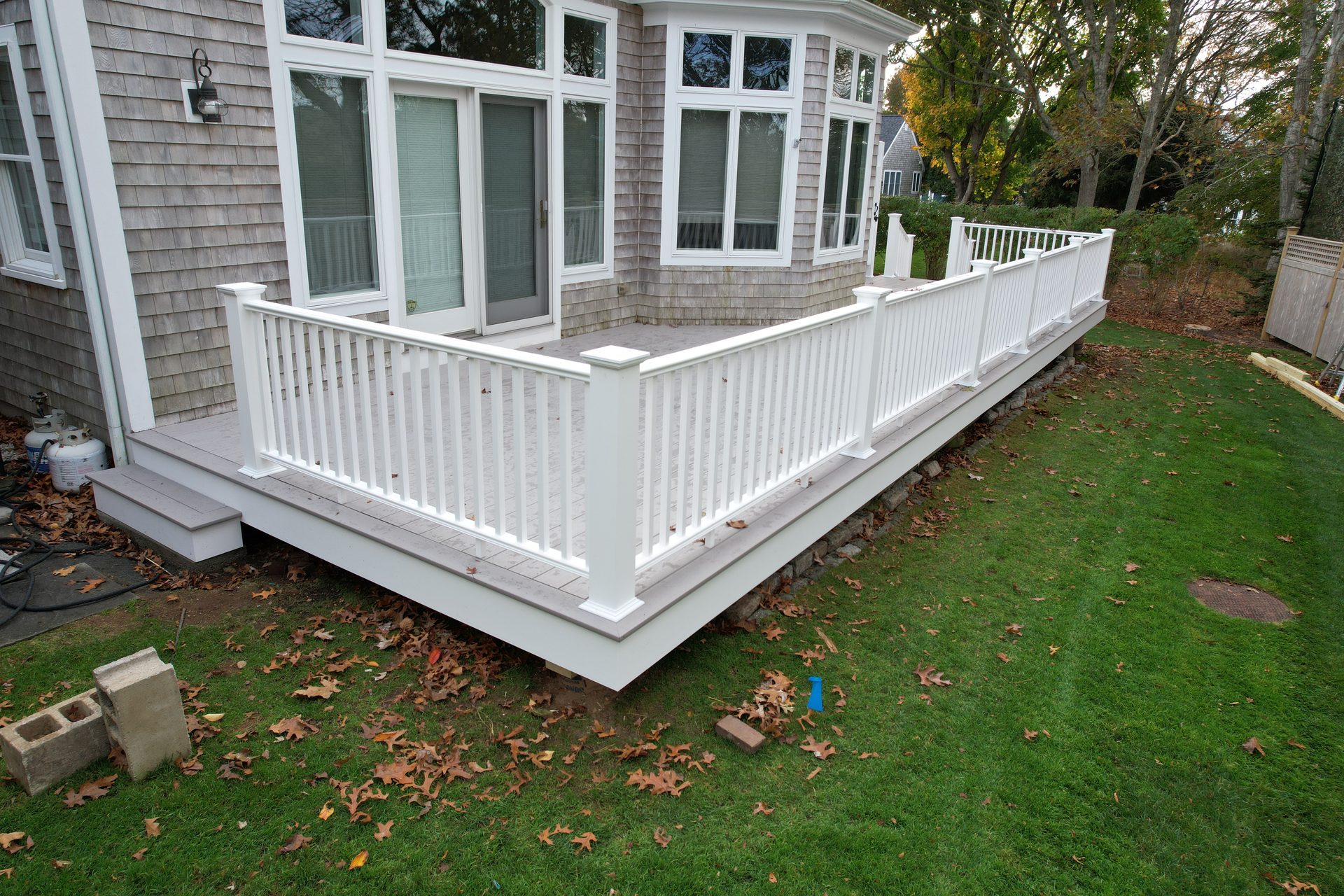 Waterfront deck with picture-frame border — HyTech Roofing, Cape Cod