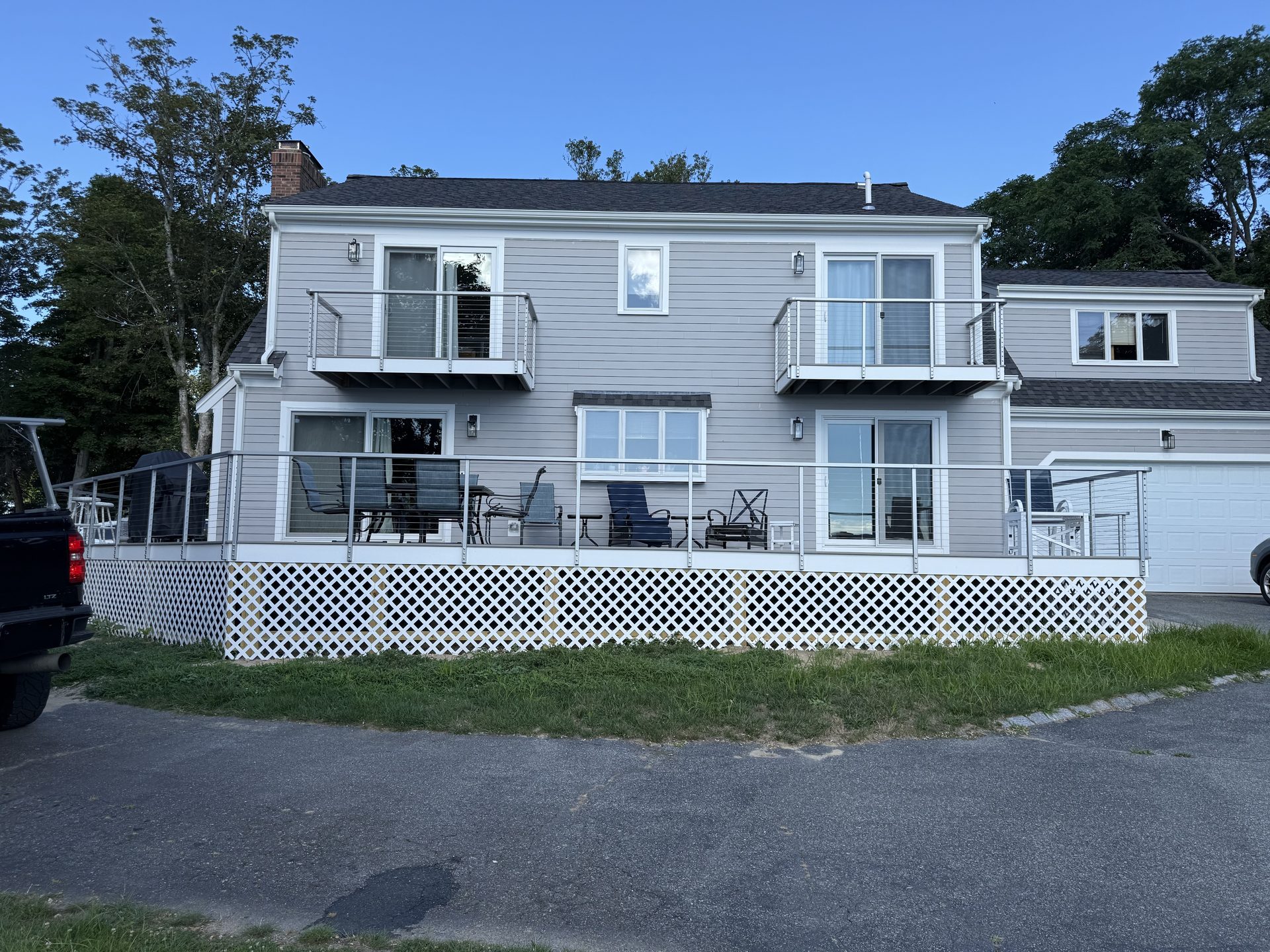 Finished deck with built-in lighting — HyTech Roofing, Cape Cod
