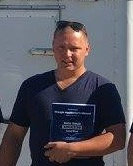 Alex Yaskavets, co-owner of HyTech Roofing Solutions
